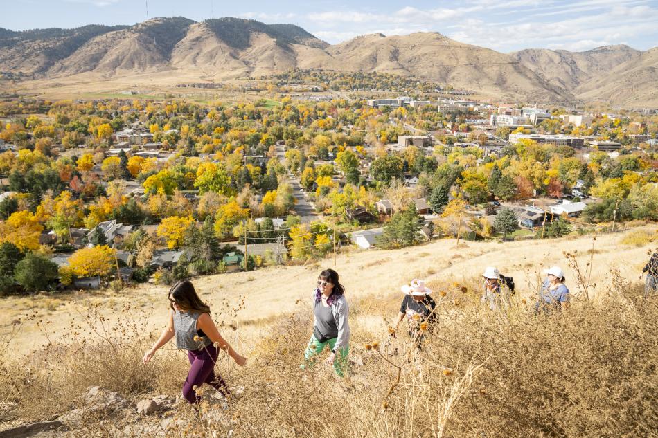 Group hiking South Table Mountain in Golden, CO during fall